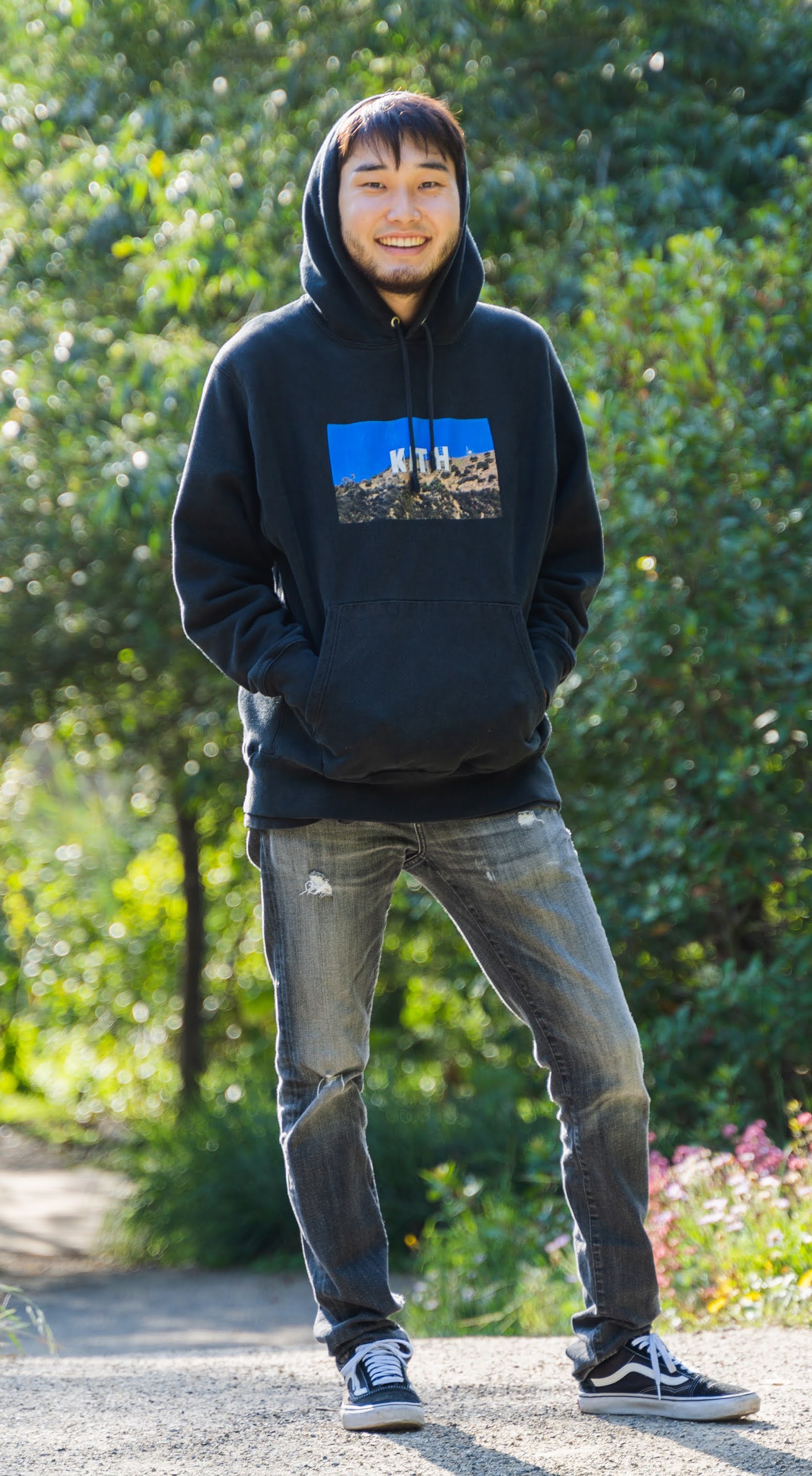 Justin standing in SF